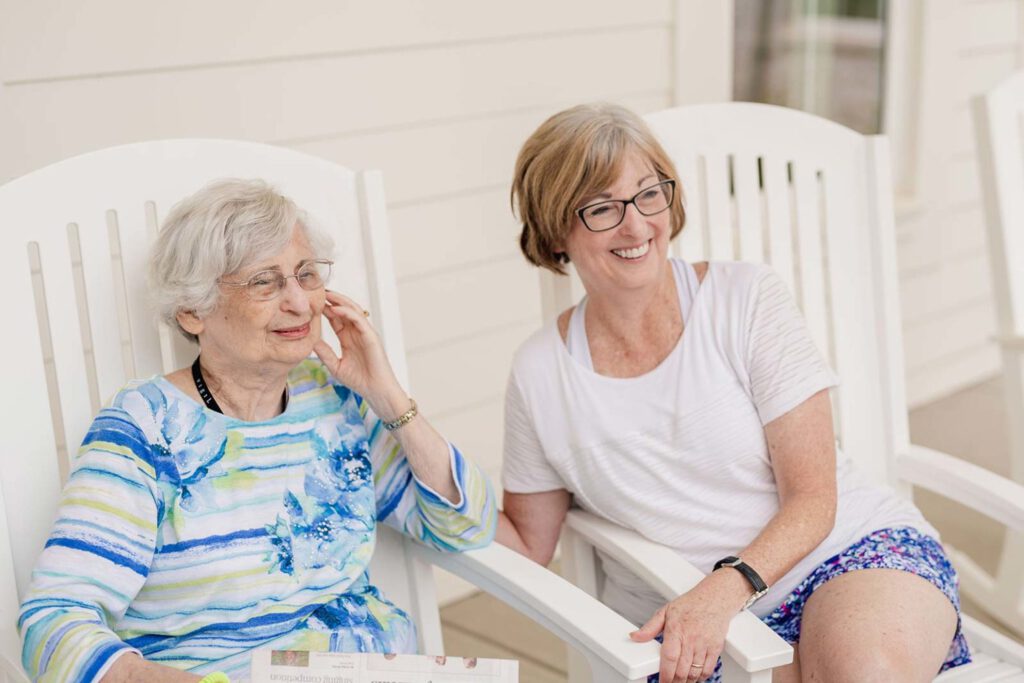 dsc09488-2-16x10-1-1536x1024 - Westhill Macon Senior woman and adult woman seated in chairs on patio